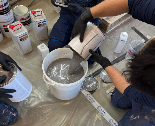 Excellence Yachtpainting team mixing Awlgrip Gloss Finish Primer